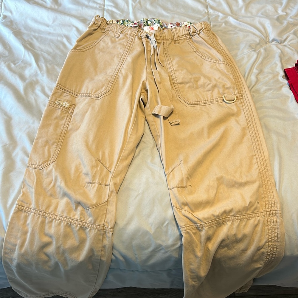 Tan koi size small, barely worn